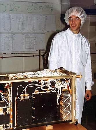 Ørsted satellite in assembly; the gold plated turnstile antenna is mounted in top corner.